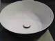 Waschbeck.aus Ocritech, Außen schwarz/Innen weiß, Maß: ø304mm H110mm